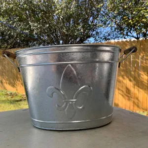 Fleur de lis Silver Galvanized Metal Bucket beverage tubs parties large ice buckets wood handles celebration cheers fireplace Egifthome Item EH10399 18" L x 12" W x 10" H, handle to handle is 18" Long