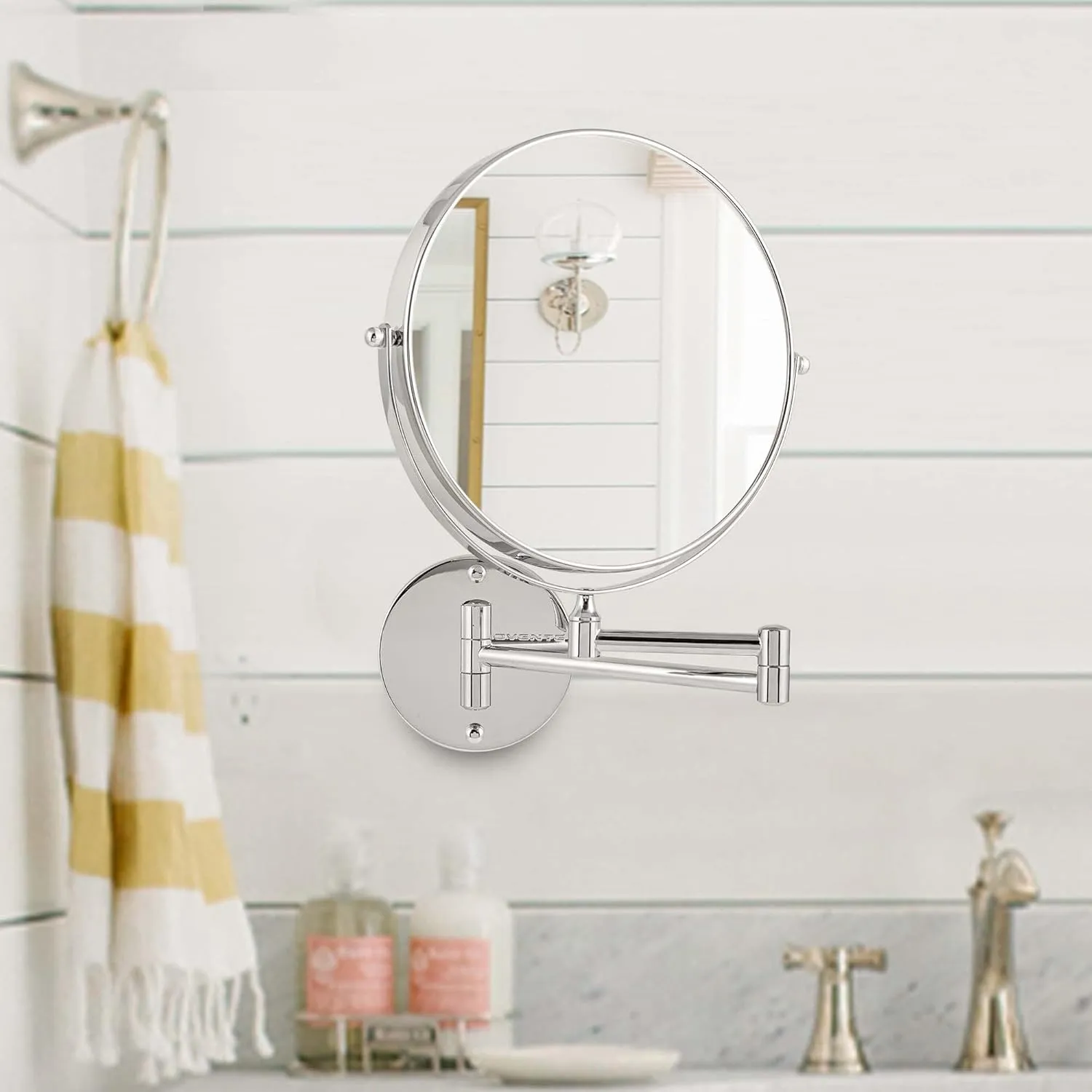 OVENTE 9" Wall Mounted Makeup Mirror with 1X/7X Magnification, Double Sided Magnifying Round Bathroom Vanity Mirror, 360° Swivel Design, Extendable and Folding Arm, Polished Chrome MNLFW90CH1X7X